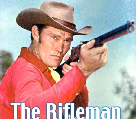AS "THE RIFLEMAN" (1958-63), CHUCK WAS 180 DEGREES FROM COWARDICE AS THE "STRAIGHT-SHOOTING LUCAS McCain. 